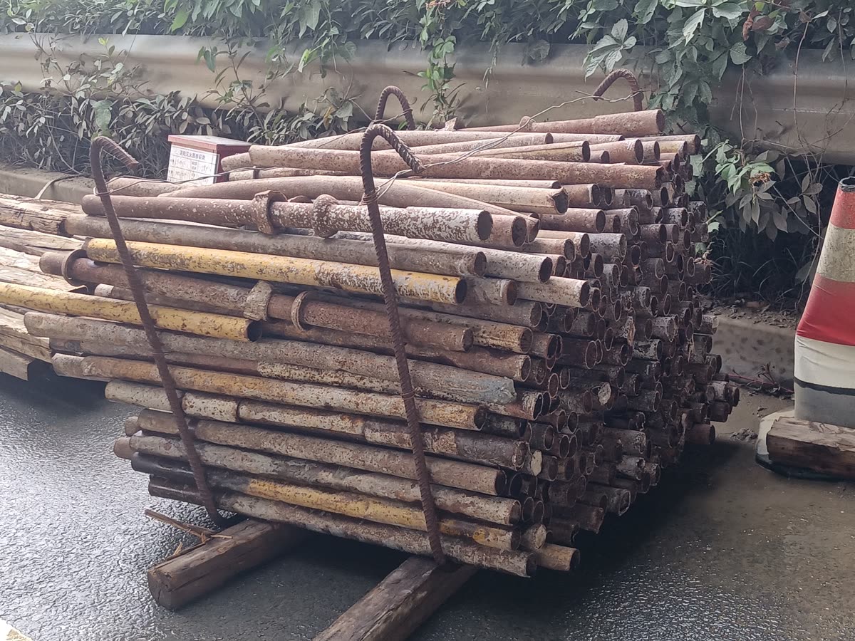 Stacked used steel line pipe